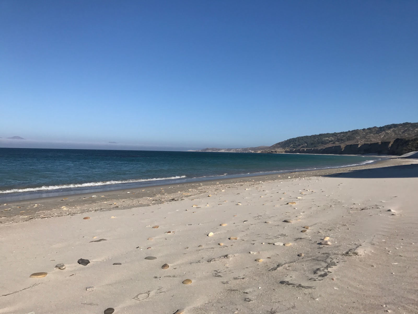 Foto di Water Canyon Beach con una superficie del sabbia luminosa