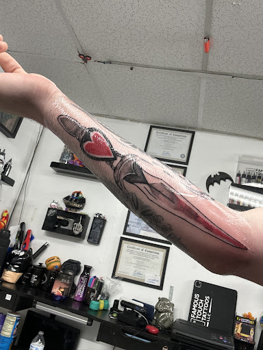 Find dog tattoo idea for your next unique tattoo in Mattapan at Famous Touch Tattoos