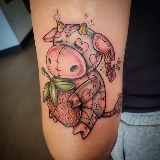 Explore female arm sleeve tattoo ideas, creative tattoo ideas in Palm Harbor, available at Angry Owl Tattoo and Piercing