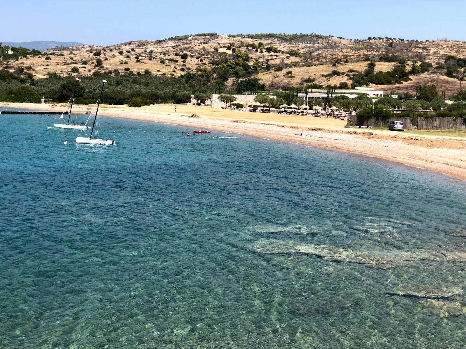 Foto di Paralia Korakia con una superficie del sabbia beige