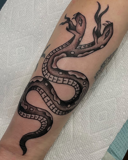 Explore hood neck tattoo ideas, creative tattoo ideas in Boston, available at Good Faith Tattoos