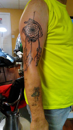 Explore male calf tattoo ideas, creative tattoo ideas in Philipsburg, available at Thunder Tattoo Studio
