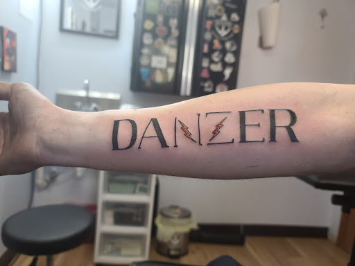 Explore house tattoo ideas, creative tattoo ideas in Whitehall, available at Beachside Tattoos & Smoke Shop