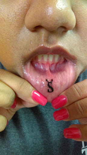 Explore temple tattoo ideas, creative tattoo ideas in Dallas, available at Fly Ink, Inc.