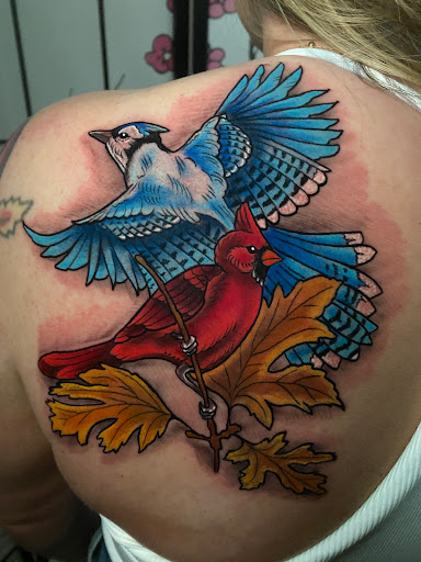 Explore christmas tree tattoo ideas, creative tattoo ideas in Ankeny, available at All Day Tattoo and Art Studio