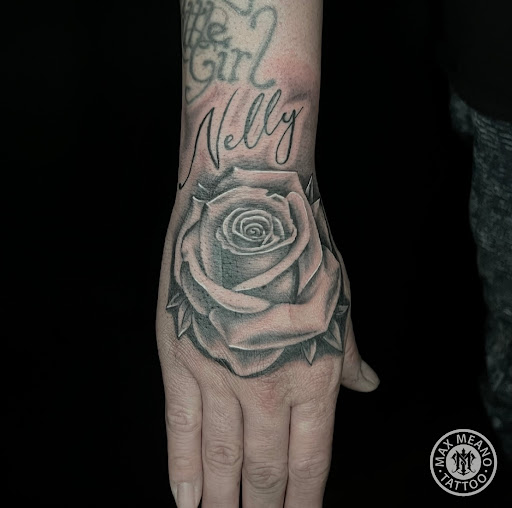 Find tattoo ideas for woman on leg for your next unique tattoo in Allentown at Max Meano Tattoo