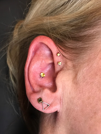 Explore ladies back tattoo ideas, creative tattoo ideas in Bloomington, available at Evil by the Needle Custom Tattoo and Piercing Studio