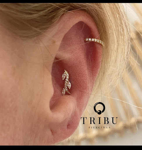 Explore chin tattoo ideas, creative tattoo ideas in Norwalk, available at Tribu Norwalk