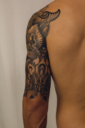 Explore grease tattoo ideas, creative tattoo ideas in Hudson, available at The Bohemian Social Club