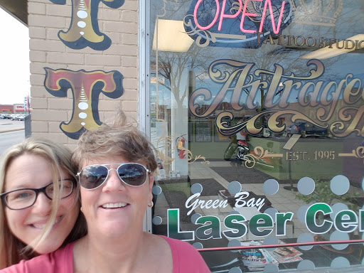 Explore small tattoo ideas behind ear, creative tattoo ideas in Green Bay, available at Artrageous Ink