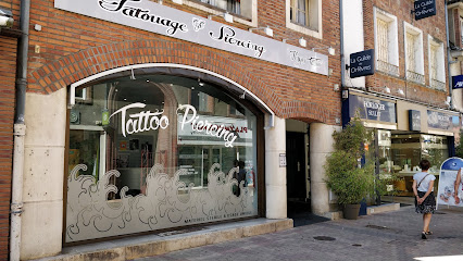 Kryss Tattoo Artist & Piercing