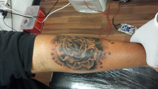 Explore rare breed tattoo ideas, creative tattoo ideas in Davenport, available at Unique Ink Art Studio