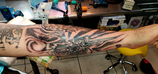 Explore letter e tattoo ideas, creative tattoo ideas in Englewood, available at The Original Big Daddy Tattoo & Body Piercing est.1997 est.1997