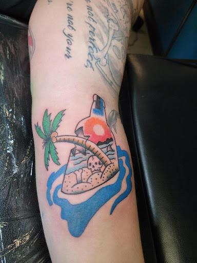 Explore rock tattoo ideas, creative tattoo ideas in Largo, available at Ink Godz Tattoo 2