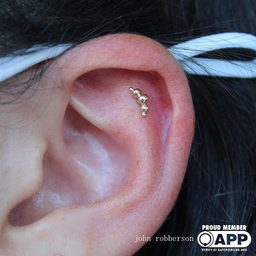 Explore jester tattoo ideas, creative tattoo ideas in Fort Myers, available at Tiger Lotus Tattoo and Piercing