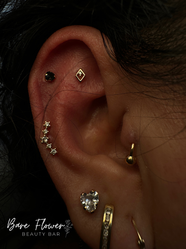 Explore fist bump tattoo ideas, creative tattoo ideas in Whitehall, available at Bare flower beauty bar