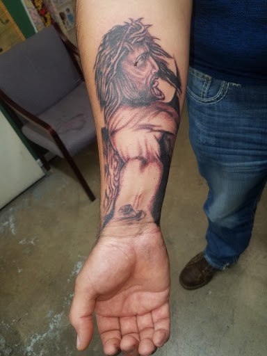 Explore tupac tattoo ideas, creative tattoo ideas in Odessa, available at Little Dragon Tattoos Studio