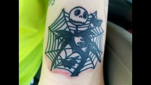 Explore healer tattoo ideas, creative tattoo ideas in Portsmouth, available at World Famous Blue Horseshoe Tattoo and Piercing