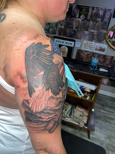 Explore hood tattoo ideas, creative tattoo ideas in Linn Creek, available at Hillard Skillard Tattoos, LLC.