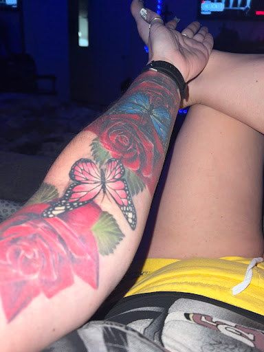 Explore cleavage tattoo ideas, creative tattoo ideas in Buckeye, available at Irie Art in Ink