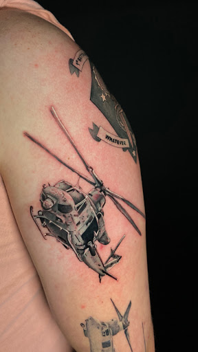 Explore women back tattoo ideas, creative tattoo ideas in Washington, available at Second Son Tattoo