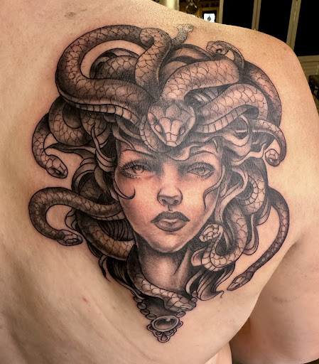 Explore enlightenment tattoo ideas, creative tattoo ideas in Bemidji, available at Your Moms Tattoo Atelier, LLC