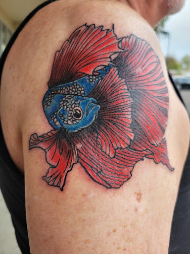 Explore tattoo ideas for young men, creative tattoo ideas in Peoria, available at Top Rocker Tattoo