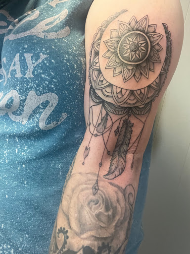 Explore cat and dog tattoo ideas, creative tattoo ideas in Tahlequah, available at Monochrome Ink