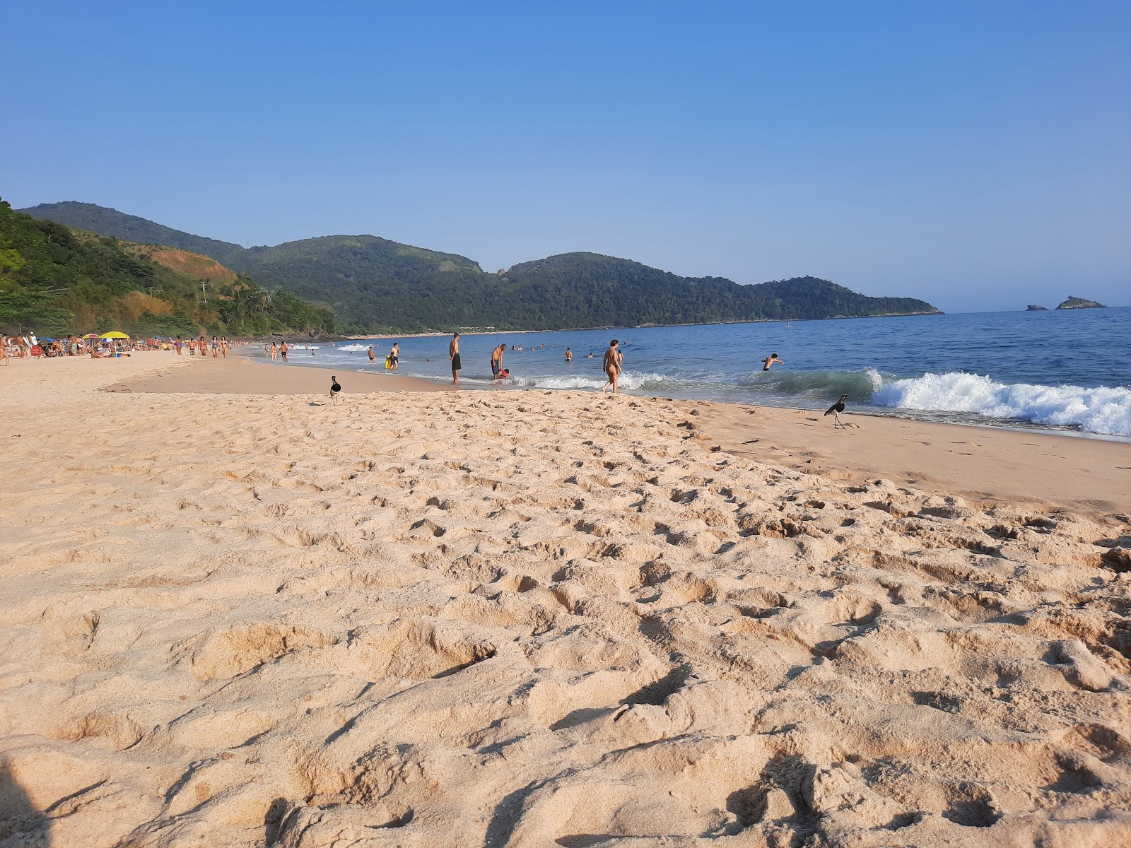 Foto di Spiaggia di Santiago con una superficie del sabbia beige fine
