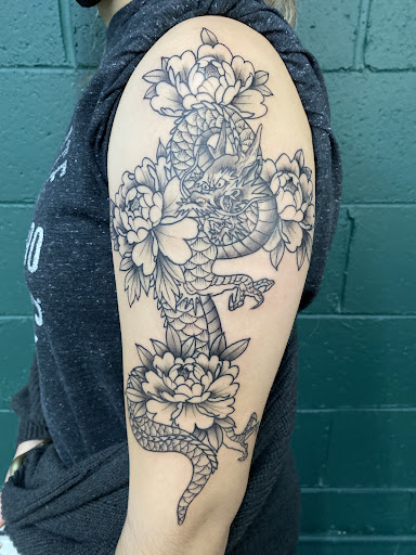 Find tattoo ideas under breast for your next unique tattoo in Richland at The Green Room Tattoo Lounge