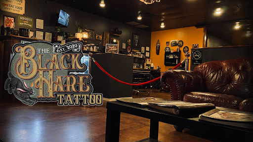 Explore half sleeve tattoo ideas black and grey, creative tattoo ideas in Conway, available at The Black Hare