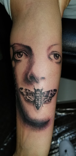 Explore halloween tattoo ideas small, creative tattoo ideas in Angola, available at Hoodlum Ink