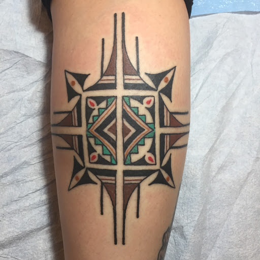 Explore cross hand tattoo ideas, creative tattoo ideas in Taos, available at Magical Tattoo