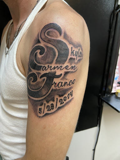 Explore butterfly and rose tattoo ideas, creative tattoo ideas in Scottsboro, available at Scottsboro Ink Therapy Tattoo Studio