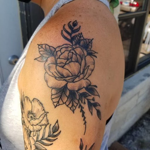 Explore insanity tattoo ideas, creative tattoo ideas in Lake Villa, available at Eternal Tiger Tattoo