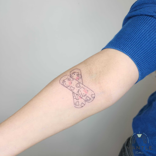 Explore locket tattoo ideas, creative tattoo ideas in Los Angeles, available at Mantle Tattoo