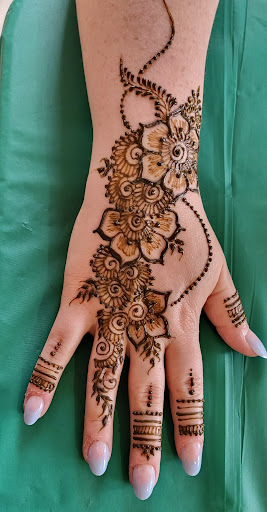 Explore snowboard tattoo ideas, creative tattoo ideas in Concord, available at Naseera Fazil Henna Art