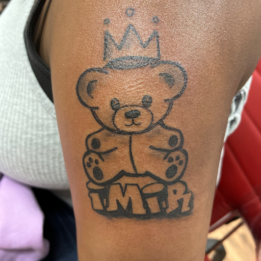 Explore dahlia tattoo ideas, creative tattoo ideas in Charlotte, available at BNI-Tattoos