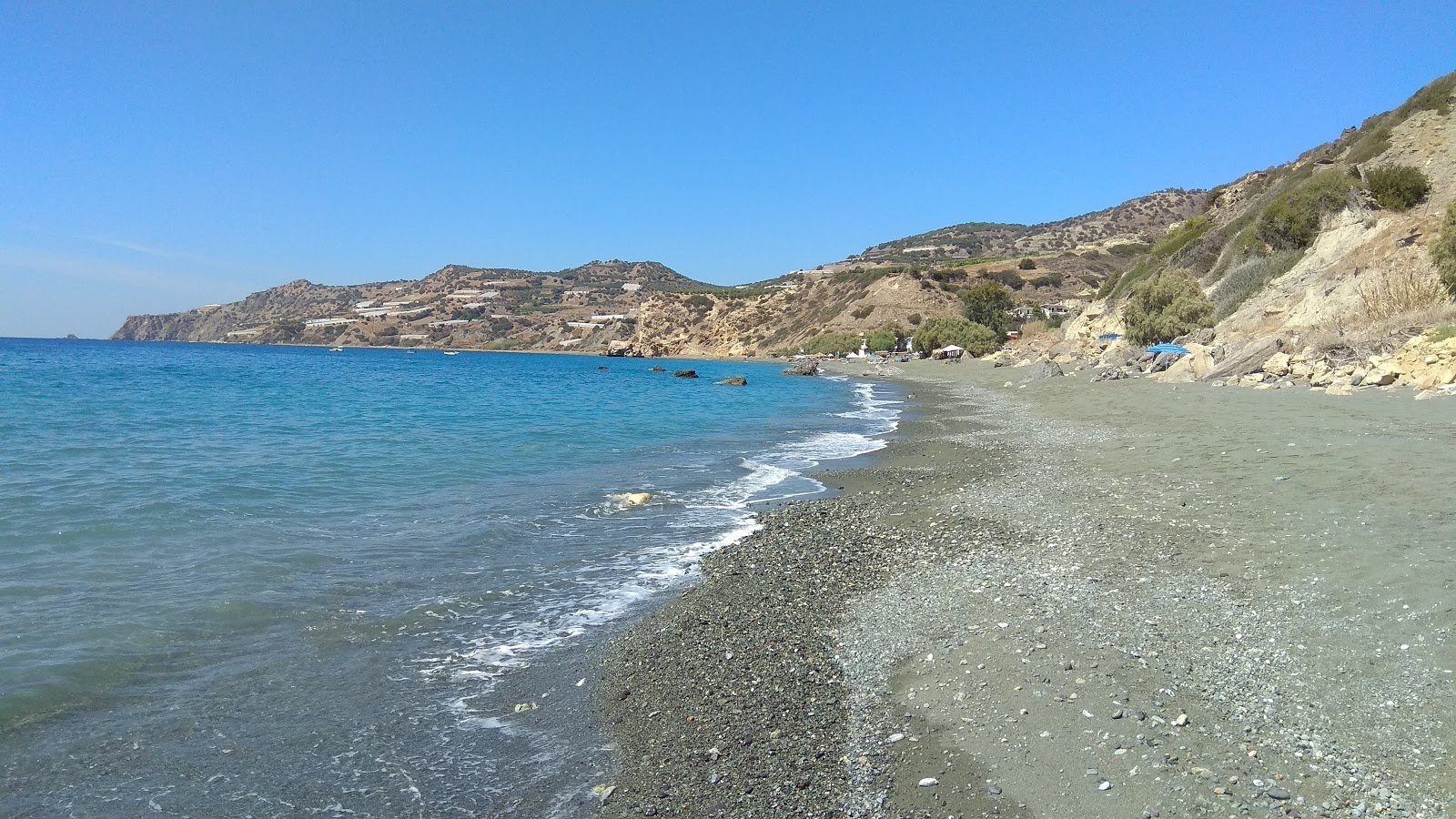 Foto de Tertsa beach con arena beige y guijarros superficie