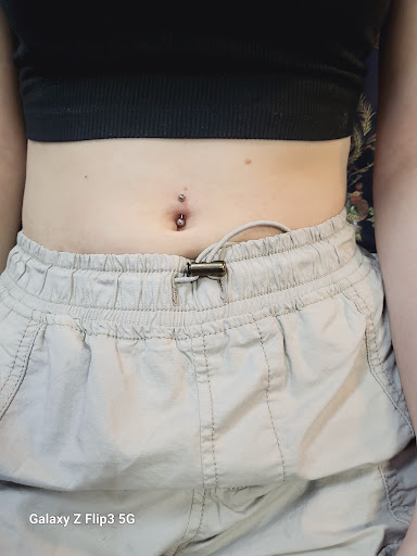 Explore lower back tattoo cover up ideas, creative tattoo ideas in Englewood, available at The Original Big Daddy Tattoo & Body Piercing est.1997 est.1997