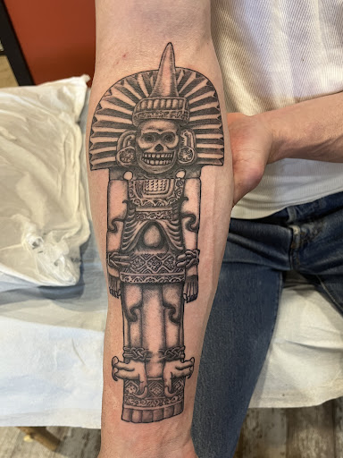 Explore justice tattoo ideas, creative tattoo ideas in Seattle, available at Hidden Hand Tattoo