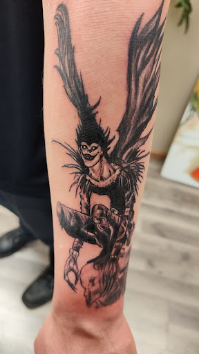 Explore michigan football tattoo ideas, creative tattoo ideas in South Sioux City, available at Hometown Hustle Tattoo