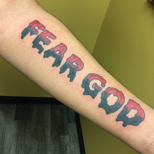 Explore origami tattoo ideas, creative tattoo ideas in Warner Robins, available at Untold Pain Tattoo Studio