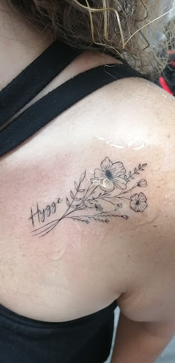 Find cool dog tattoo ideas for your next unique tattoo in Charlotte at Black Cloud Tattoo & Piercing