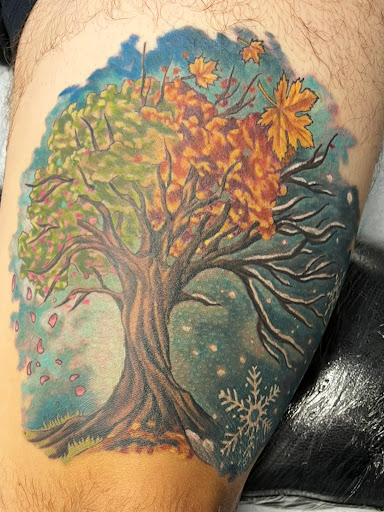 Explore kiss tattoo ideas, creative tattoo ideas in Pittsburg, available at Delta Art & Tattoo