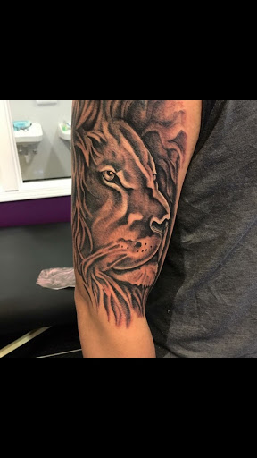 Explore mens leg tattoo ideas, creative tattoo ideas in Westland, available at Skin Sinn tattoos