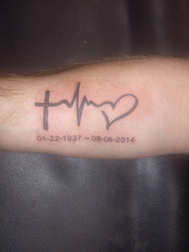 Find tattoo ideas under breast for your next unique tattoo in Kewanee at Splat Ink tattoos and piercings