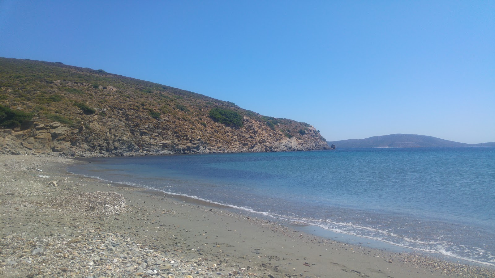 Photo of Diapori beach with turquoise pure water surface