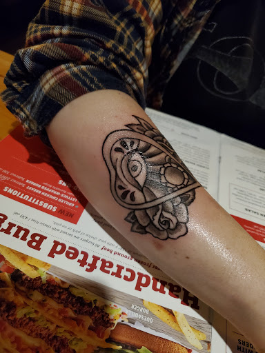 Explore simple skull tattoo ideas, creative tattoo ideas in Hurricane, available at Jekyll and Hyde Tattoo