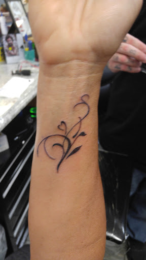 Explore tattoo ideas for back of the neck, creative tattoo ideas in South Bend, available at Marvel Tattoo & Piercing